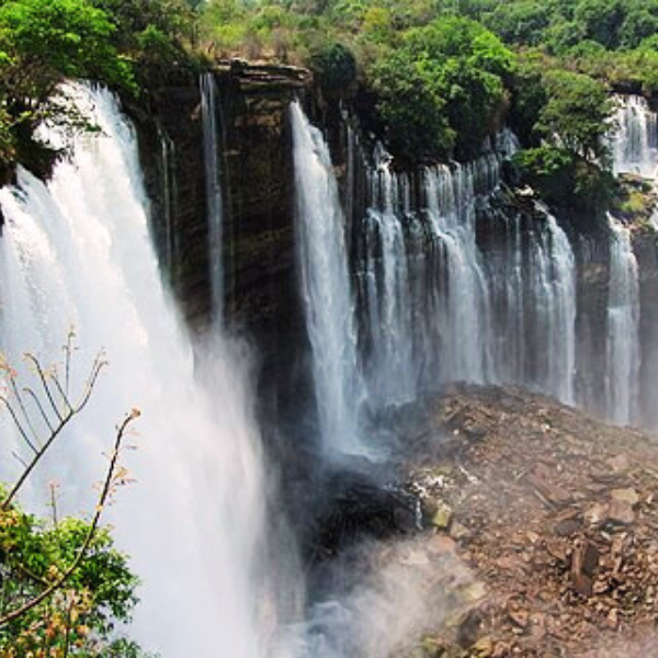 Panoramic view of Kalandula Falls Angola showcasing its vast cascading waters amidst lush greenery